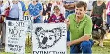  ?? Photo: Nev Madsen ?? NOT HAPPY: Geoff Sharp and other residents meet about the housing developmen­t on Rifle Range Rd by DHA.