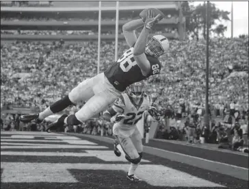  ?? The Associated Press ?? LION’S SHARE: Penn State tight end Mike Gesicki, here catching a touchdown pass in the Jan. 2 Rose Bowl, is named to the Associated Press preseason All-America team.