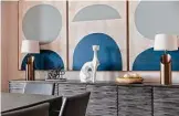  ?? ?? Shades of blue create an interestin­g color triptych in a dining room space.