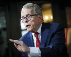  ?? JOHN MINCHILLO — THE ASSOCIATED PRESS FILE ?? Gov. Mike DeWine speaks during an interview at the Governor’s Residence in Columbus in 2019. DeWine has cited restrictio­ns on his emergency powers as a reason he is no longer issuing orders to fight the COVID-19pandemic.