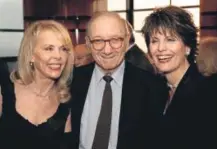  ?? Seth Wenig, The Associated Press ?? Neil Simon, center, his wife Elaine Joyce, left, and Lucie Arnaz pose for a picture at the reception for the Eugene O'Neill Theater Center's Monte Cristo Award in New York. Simon died on Sunday. He was 91.