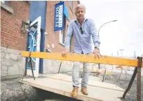  ?? PIERRE OBENDRAUF ?? Ted Dranias stands at the front entrance of his restaurant Petros, located on William St., which is under constructi­on again.