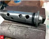  ??  ?? 4 Special bolt keeps case together.