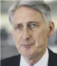  ??  ?? Philip Hammond: Move would have seen extra costs