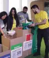  ?? ?? Volunteers pack items for donation as part of the 30 days x 30 deeds campaign launched by Century Financial.