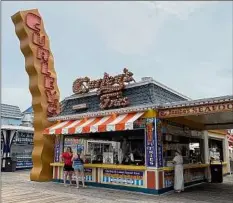  ??  ?? A view from the boardwalk in Wildwood, N.J.