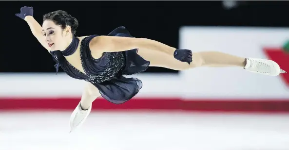  ?? DARRYL DYCK/THE CANADIAN PRESS ?? Kaetlyn Osmond fell at the start of her short program at the Canadian figure skating championsh­ips in Vancouver Friday, but still sits in second place.