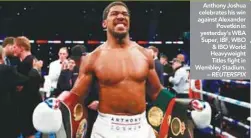  ??  ?? Anthony Joshua celebrates his win against Alexander Povetkin in yesterday’s WBA Super, IBF, WBO &amp; IBO World Heavyweigh­t Titles fight in Wembley Stadium. –