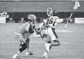  ?? HANDOUT ?? Chesapeake Bayhawks short-stick defensive midfielder Isaiah Davis-Allen, right, has given Major League Lacrosse a voice in the national discussion about social justice.