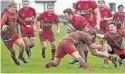  ??  ?? Carwyn Roberts is tackled