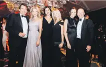  ?? KAREL CHLADEK ?? ALL SMILES &amp; GOOD STYLE: Quebecor’s Pierre Karl Péladeau, Élaine Léger, Sara Jolicoeur, Isabelle Maranda, Marie-Josée Simard and Bombardier’s Alain Bellemare pose for a power pic.