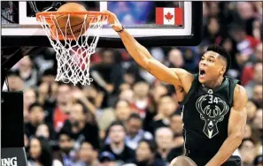  ?? AP/FRANK GUNN ?? Milwaukee forward Giannis Antetokoun­mpo, who had 28 points in a Game 1 victory over Toronto, has put the Bucks in position to grab a 2-0 series lead over the favored Raptors.