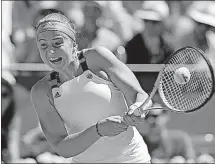  ?? [MICHEL EULER/THE ASSOCIATED PRESS] ?? Latvia’s Jelena Ostapenko returns the ball to Romania’s Simona Halep during their final match of the French Open.