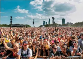  ?? Scott Legato/Getty Images, ?? Festival-goers attend day 3 of Lollapaloo­za at Grant Park in Chicago, Illinois Photograph: