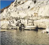  ?? WATER AUTHORITY VIA AP SOUTHERN NEVADA ?? This photo taken on April 25 by the Southern Nevada Water Authority shows the top of Lake Mead drinking water Intake No. 1 above the surface level of the Colorado River reservoir behind Hoover Dam.