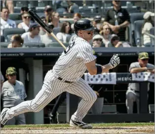  ?? BEBETO MATTHEWS — THE ASSOCIATED PRESS ?? Yankees third baseman Josh Donaldson (28) makes a swinging strike on a pitch during last Saturday’s game against the White Sox in New York.