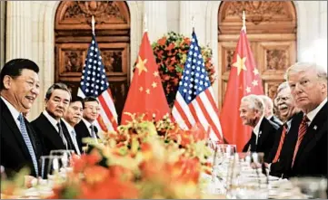  ?? PABLO MARTINEZ MONSIVAIS/AP ?? Chinese leader Xi Jinping, left, and President Donald Trump’s dinner came amid a trade dispute between the two nations.