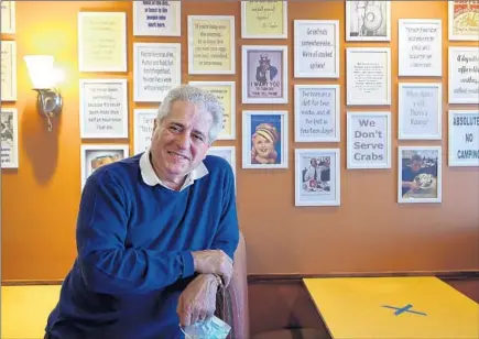  ?? TERRENCE ANTONIO JAMES/CHICAGO TRIBUNE ?? Jim Banakis stands inside his restaurant Juicy-O in Downers Grove on Tuesday. He’s been in the business all his life.