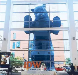  ??  ?? The Denver Blue Bear watches over Denver Convention Center and iPW delegates during the three-day marketplac­e exchange.