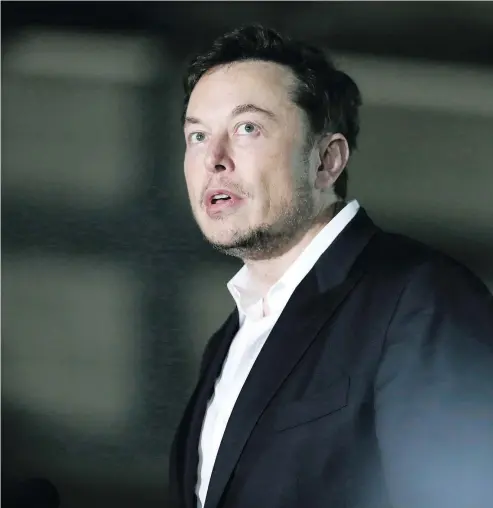  ?? — KIICHIRO SATO / THE ASSOCIATED PRESS FILE ?? Shares at Elon Musk’s company, Tesla, dropped back to near the level they were trading at before Musk tweeted he may take the company private.