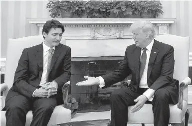  ??  ?? Prime Minister Justin Trudeau with U.S. President Donald Trump. NAFTA renegotiat­ions can’t begin until Robert Lighthizer is confirmed as trade czar. Failure to get a deal within a few months could delay the process to 2019.