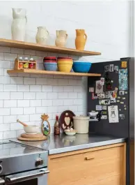  ??  ?? ABOVE The pantry, island and drawers all follow the same form, with solid French oak timber on either end and front-facing panels pushed back into the framing to allow the handles to sit flush. LEFT Deep drawers keep more unwieldy kitchen equipment out of sight.