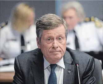  ?? CHRIS YOUNG THE CANADIAN PRESS ?? Toronto Mayor John Tory on Thursday. He says he “strongly” supports a plan for more cameras and microphone­s to curb gun violence.