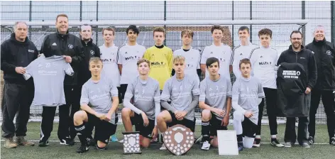  ??  ?? Werrington Athletic Under 16s won their first league match since April 2015 at the weekend. They are pictured with sponsors Christophe­r Ebbs from Werrington Gas Services, Martin Greaves from MP Flooring Ltd and Paul Barker from Delta ‘T’ (Trace...