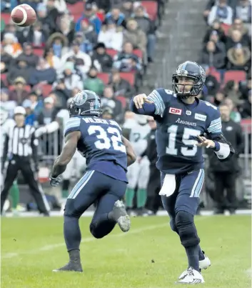  ?? STAN BEHAL/ TORONTO SUN ?? The Toronto Argonauts’ Ricky Ray makes a pass against the Saskatchew­an Rough Riders, at BMO Field. The Argos take on the Calgary Stamperder­s on Sunday for the Grey Cup.