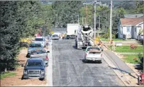  ?? GARY KEAN/THE WESTERN STAR ?? Government funding announced Monday will go toward infrastruc­ture upgrades in the Humber-gros Morne district, similar to the work being done on Third Avenue in Deer Lake Monday.