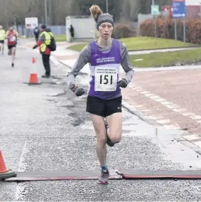  ??  ?? First female
Catriona MacDonald of Bellahoust­on Road Runners