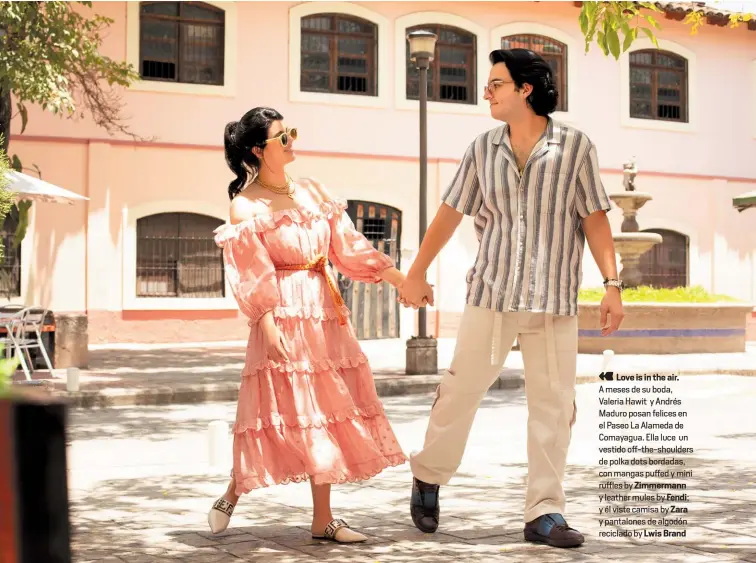  ??  ?? Love is in the air.
A meses de su boda, Valeria Hawit y Andrés Maduro posan felices en el Paseo La Alameda de Comayagua. Ella luce un vestido off-the-shoulders de polka dots bordadas, con mangas puffed y mini ruffles by Zimmermann y leather mules by Fendi; y él viste camisa by Zara y pantalones de algodón reciclado by Lwis Brand