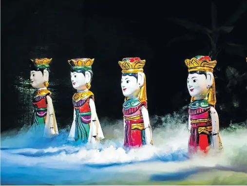  ?? Picture: http://vietnamhol­iday.com ?? The water puppet show in Hanoi which had three generation­s awestruck.