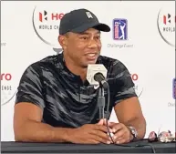  ?? Doug Ferguson / Associated Press ?? Tiger Woods holds his first press conference since his Feb. 23 car crash in Los Angeles at the Hero World Challenge golf tournament in Nassau, Bahamas on Tuesday. Woods wouldn’t commit to if or when he could possibly return to action.