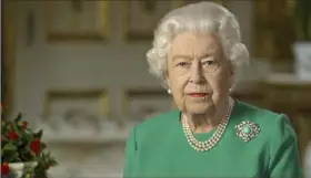  ?? Buckingham Palace via Associated Press ?? Queen Elizabeth II makes an exceedingl­y rare televised address to Britain in a video released Sunday evening.