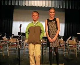  ?? CHAD FELTON — THE NEWS-HERALD ?? Andrews Osborne Academy fourth-graders Bierson Cerar and Camille Lovins enjoyed PROJECT Trio at the school on April 5.