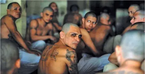  ??  ?? LEADERS OF THE MARA SALVATRUCH­A IN THE CIUDAD BARRIOS PRISON IN THE EASTERN SALVADORAN DEPARTMENT OF SAN MIGUEL, IN 2012. CREDIT: TOMÁS ANDRÉU/IPS