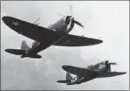  ?? THE ASSOCIATED PRESS ?? This file photo shows two Thunderbol­t P-47fighter planes during a test flight in the United States. In May 1944, a P-47piloted by U.S. Lt. Frank Fazekas was hit by German fire over Buysscheur­e, northern France. Two boys watched from their family’s farm...