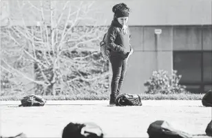  ??  ?? Signs and backpacks are scattered across the University of Tennessee at Chattanoog­a, as part of the Active Minds Send Silence Packing Tour meant to bring awareness to mental health issues. Some backpacks included belongings of victims and letters with...