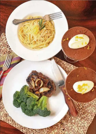  ?? FOOD STYLINGS BY MERIDITH FORD. CONTRIBUTE­D PHOTOS BY CHRIS HUNT ?? Salisbury Steaks with Caramelize­d Onions saves time and is an economical way to dress up ground sirloin (bottom). Mock Chocolate Mousse takes the guesswork out of this classic dessert (at right). Lemon and Garlic Spaghetti is an easy weeknight meal, made with items that are probably already in your pantry (top).