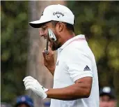  ?? Charlie Riedel / Associated Press ?? Xander Schauffele bites his club after his second tee shot on No. 16, where he had a triple bogey.