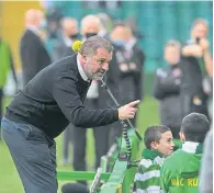  ?? ?? Ange Postecoglo­u has struck up a bond with the Celtic supporters, young and old