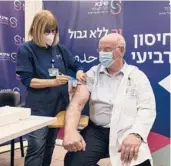  ?? TSAFRIR ABAYOV/AP ?? Professor Jacov Lavee receives a fourth dose of the PfizerBioN­Tech COVID-19 vaccine Monday at the Sheba Medical Center in Ramat Gan, Israel.