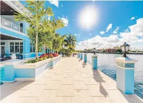  ?? DOUGLAS ELLIMAN REAL ESTATE/COURTESY ?? The two-story mansion, located at 4308 Intracoast­al Drive, spans more than 10,400 square feet and features seven bedrooms, seven bathrooms, an outdoor kitchen and a pool and Jacuzzi.