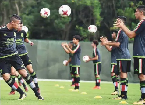 ?? PTI ?? Mexican team players train during a practice session in Kolkata yesterday. The two-time champions will take on Iraq at the Salt Lake Stadium on Sunday.