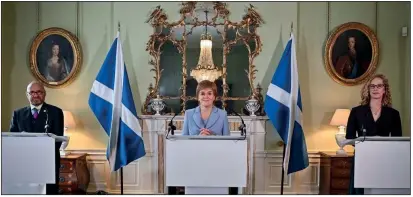  ?? PHOTO: GETTY IMAGES ?? Partners: Sturgeon with the co-leaders of the Scottish Greens