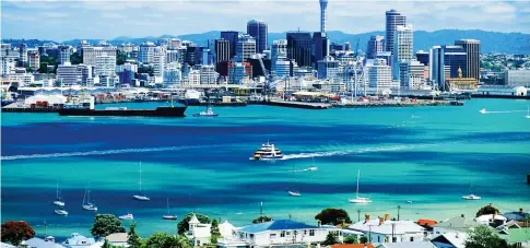  ??  ?? Things are looking up: The 328 metre Sky Tower, above the fashionabl­e Ponsonby district of Auckland