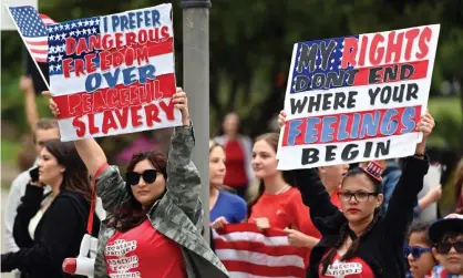  ??  ?? Protesters gather in Sacramento, California. The demonstrat­ions have largely targeted Democratic governors. Photograph: Josh Edelson/ AFP via Getty Images