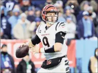  ?? Andy Lyons / TNS ?? The Bengals’ Joe Burrow looks to pass against the Titans during the first half in the AFC divisional playoff game at Nissan Stadium last week.