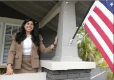  ?? John Raoux/Associated Press ?? Florida state Rep. Anna Eskamani in front of her office Wednesday in Orlando, Fla. For the first time in 27 years, the U.S. government announced changes to how it categorize­s people by race and ethnicity. "It feels good to be seen," said Ms. Eskamani, whose parents are from Iran.